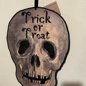 Spooky Trick or Treat Skull Head Hanging Wall Plaque